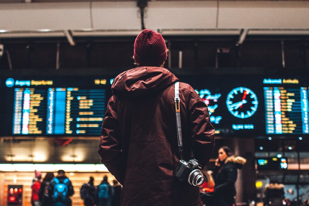 Traveler wearing a comfortable airport outfit in a terminal